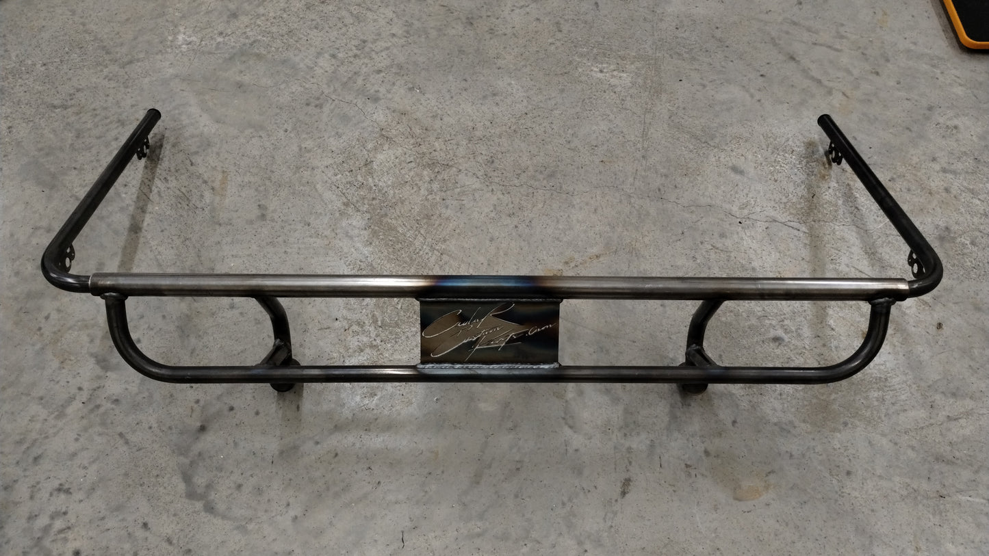 Full containment wedge rear bumper